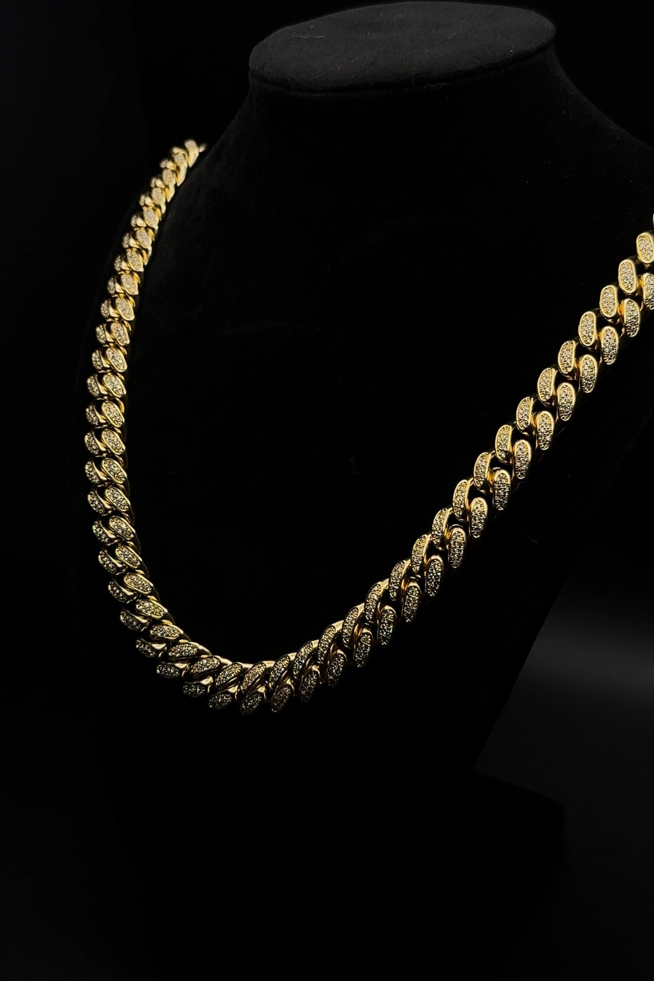 Classic Canine Crystal Chain dog collar in gold tone on a display bust