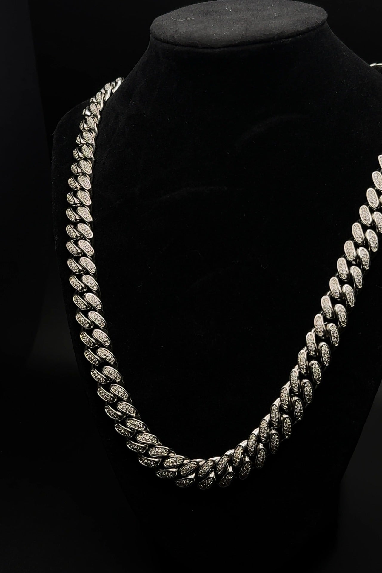 Classic Canine Crystal Chain dog collar in silver tone on a display bust
